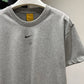 Nike NOCTA Tee (Heather Gray)